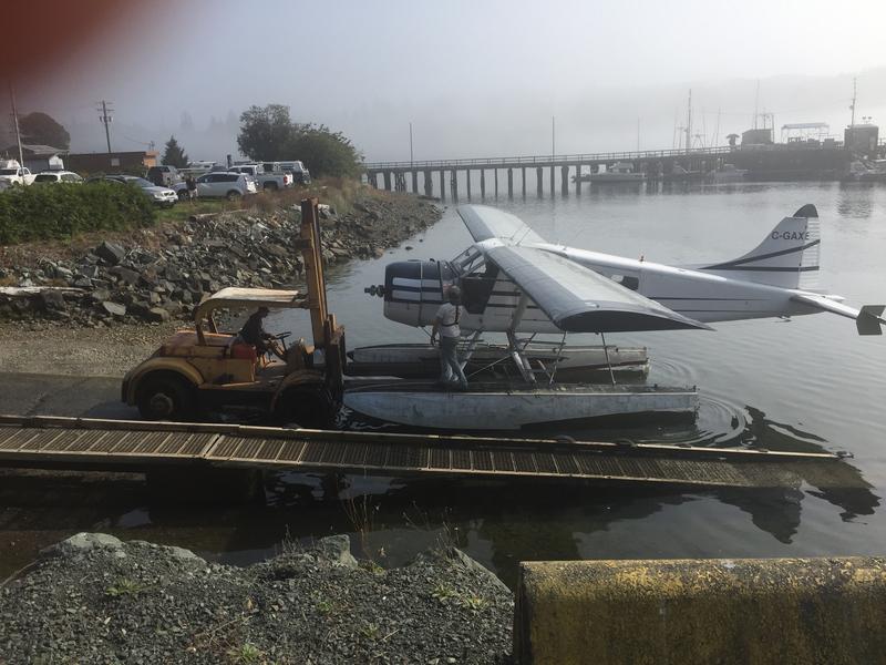 Sea plane being launched by forklift in Coal Harbour